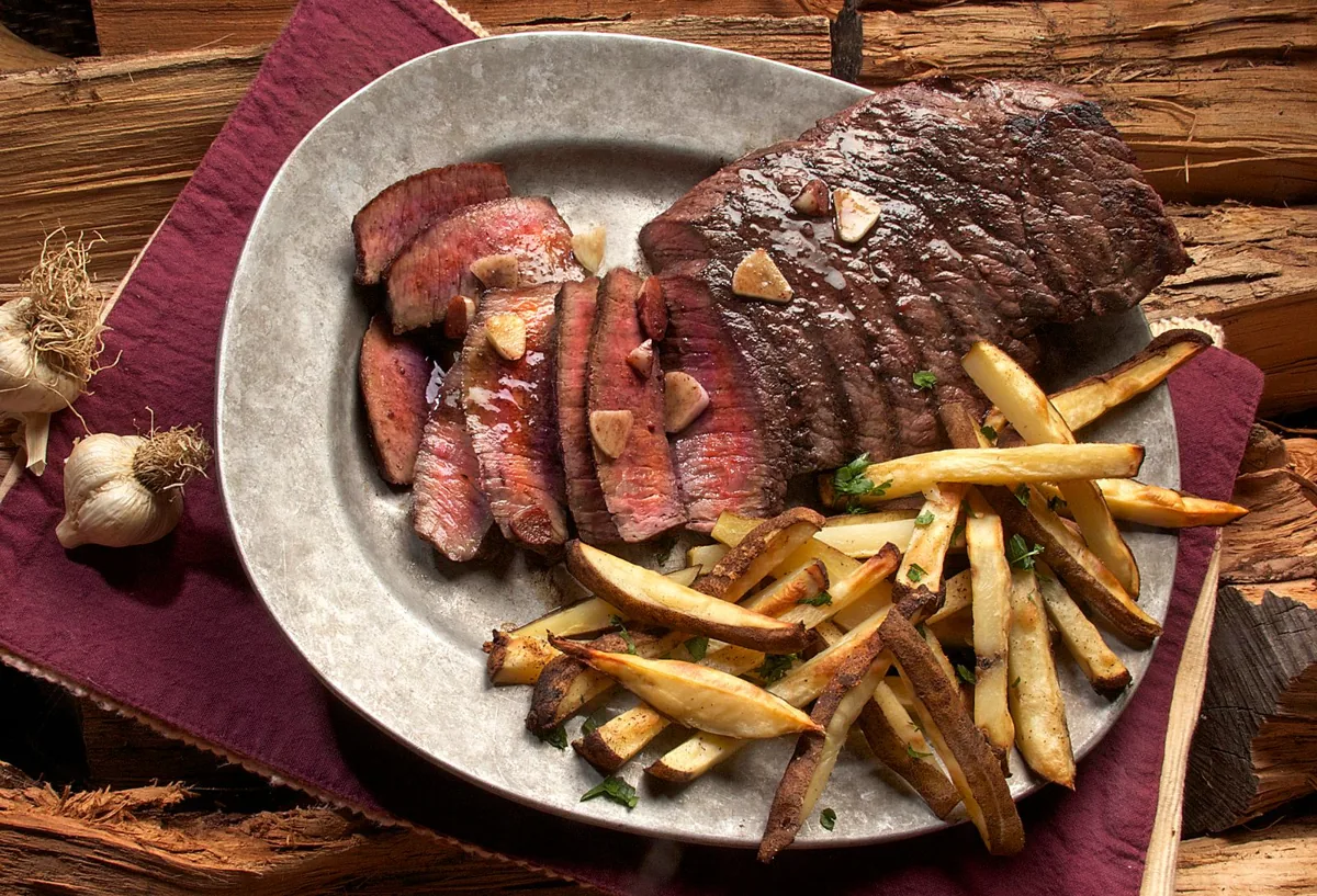 A prepared steak served in a restaurant
